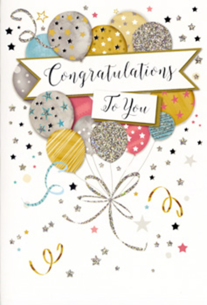 In this photograph, a refined congratulations card stands upright, its design evoking the lightness and celebration you might feel watching balloons lift against the broad Blackheath skyline. The central motif is a generous bouquet of illustrated balloons that fills much of the card's front, layered in a way that creates depth and the gentle illusion of movement. The balloons are rendered in a soothing palette of metallic-inspired tones: warm gold, polished silver, pale champagne, dusty sky blue, blush pink, and soft grey, all harmonising gracefully. Each balloon carries its own distinctive decoration-fine stripes, clusters of tiny stars, or delicate confetti dots-outlined in shimmering ink that gives a sense of subtle sparkle. Thin strings and curling ribbons made of gold and silver sweep down and across the design, intersecting with scattered stars and swirling accents that add rhythm and energy without overwhelming the eye. At the heart of this floating arrangement, a gently arched banner stretches from side to side, inscribed with Congratulations To You in stylish, handwritten-style calligraphy. The lettering feels both personal and polished, equally appropriate for academic successes, professional milestones, or quieter triumphs celebrated within family homes around Blackheath. The background is kept intentionally light and open, punctuated only by small stars and fine curls that hint at confetti drifting through the air after a toast. The overall mood is one of calm yet unmistakable joy. Seen through the lens of a local florist, the card resembles a carefully balanced bouquet crafted for delivery across SE3: every shade thoughtfully chosen, every detail designed to help the recipient feel truly seen and celebrated in their special moment.