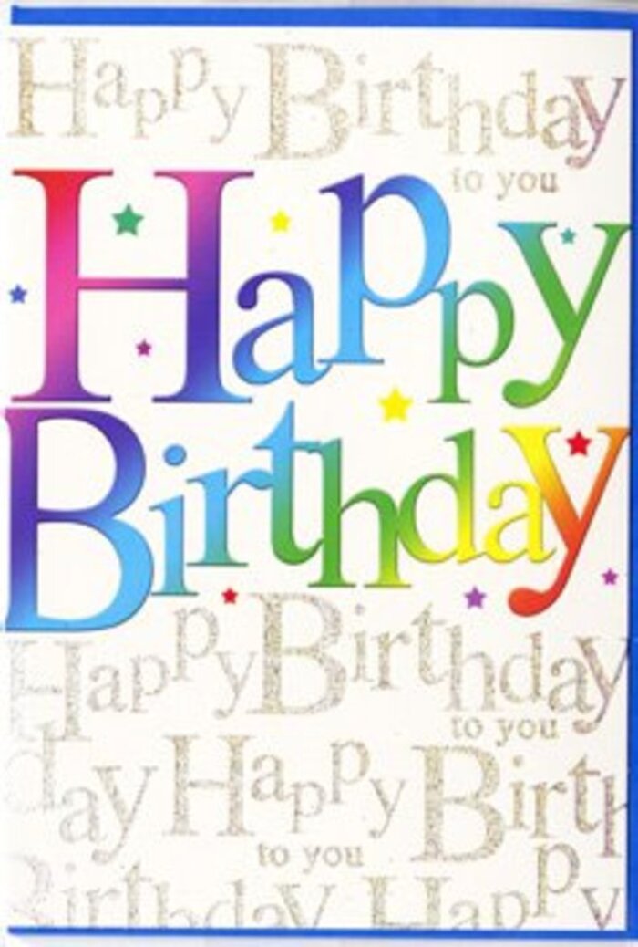 This birthday card conveys an immediate sense of celebration, carefully balancing lively colour with refined detail, like a bouquet crafted for a special gathering in Blackheath Village. Across the centre, the bold words Happy Birthday dominate the scene in a generous, rounded typeface. Each letter is infused with a velvety gradient that drifts from one colour to the next, creating a smooth ribbon of rainbow across the card. You can trace the journey from deep garnet and hot pink, through vibrant magenta and rich violet, across into sapphire blue and sea-green, and finally into lime, butter yellow, and glowing amber. It's the sort of palette that calls to mind bunting strung along a garden fence or the varied blooms in a birthday bouquet on a Blackheath kitchen table. The letters seem subtly raised, likely embossed or printed with extra thickness, giving them a tactile quality that invites fingertips to follow each curve. Behind this main text, the card is layered with elegant script, repeating Happy Birthday to you in delicate, looping strokes of metallic gold. These lines flow in softly angled bands that cross the card like gentle waves or the paths winding across the heath. The gold ink adds a sophisticated shimmer, not a harsh glitter, catching hints of ambient light in a way that feels both festive and tasteful. Small, scattered specks and star-like shapes echo the playful mood of confetti or tiny lights at an evening gathering. The overall composition is bright yet harmonious, making it suitable for anyone's milestone or simple annual birthday, and you can easily imagine it standing beside a vase of freshly delivered blooms in a Blackheath bay window, bringing a note of warmth and colour to the day.